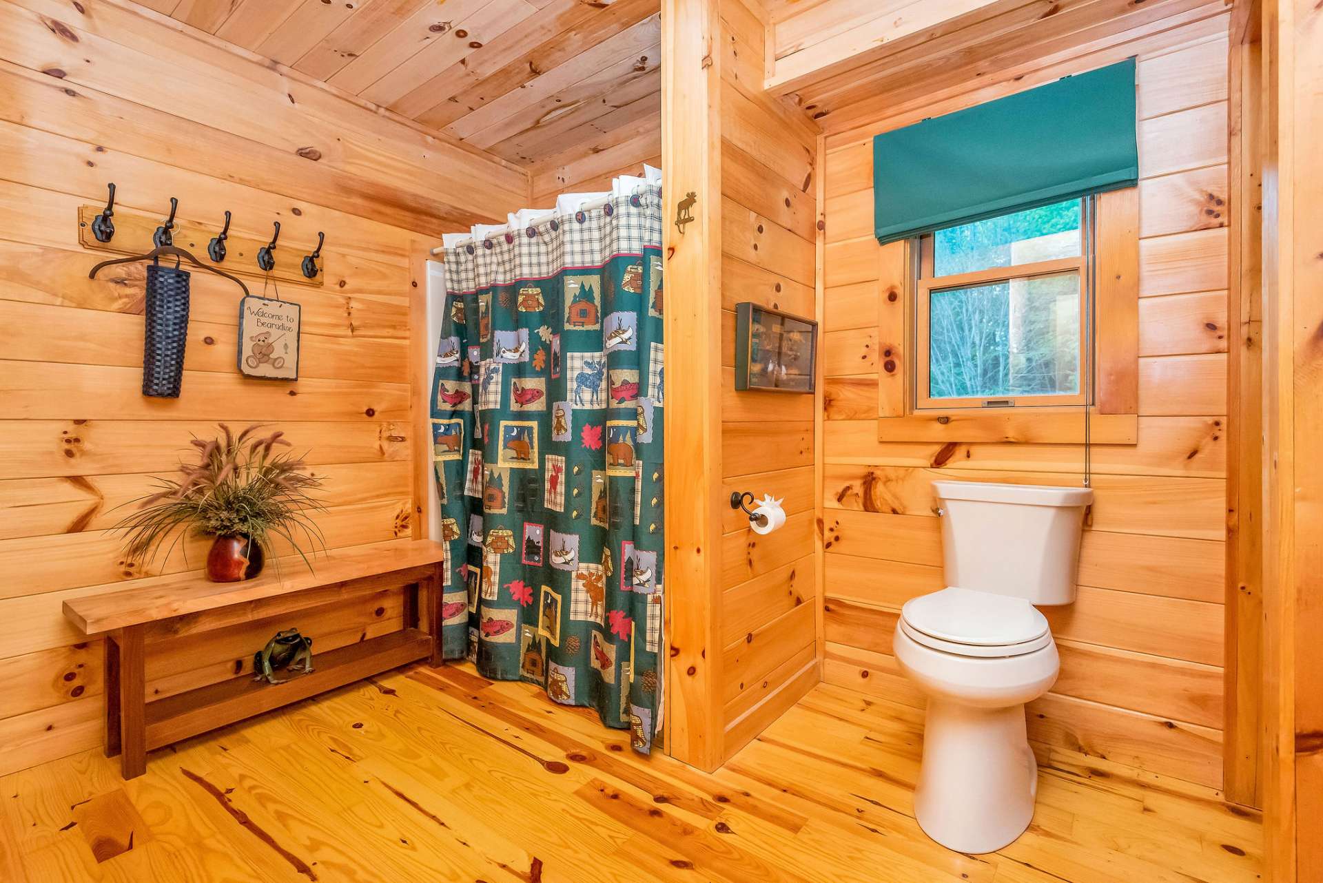 The main level bathroom completes the convenience of one-level living in this home, providing accessibility and comfort without the need to navigate stairs.
